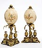 A very rare pair of Louis XV gilt bronze mounted polychrome-painted ostrich eggs attributed to Lebel